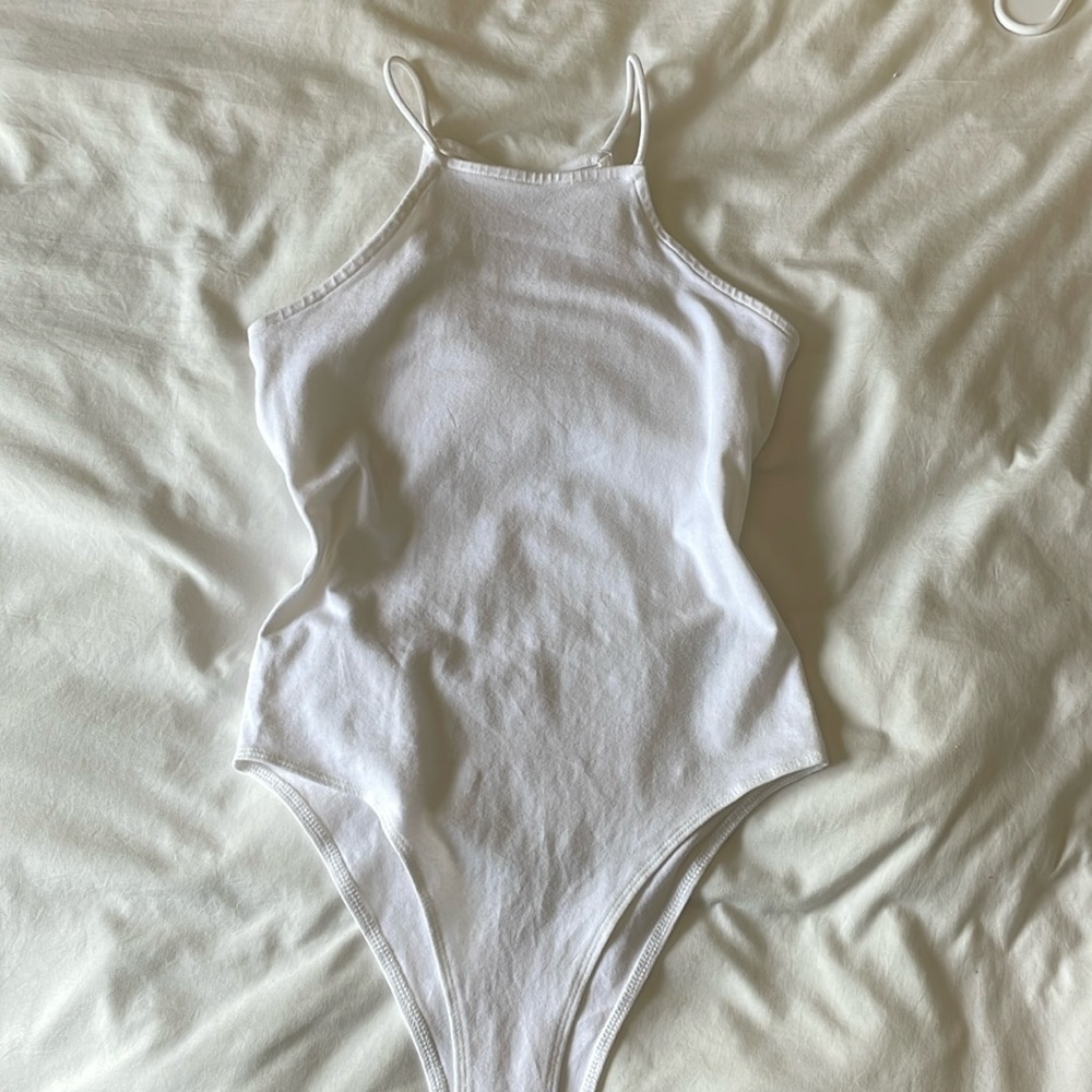 white women’s XS bodysuit